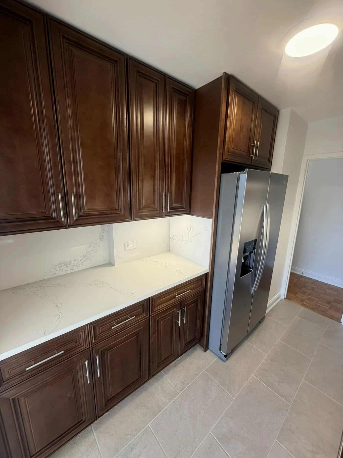 Charleston Saddle kitchen cabinets installed in a Lakeview East, Chicago condo