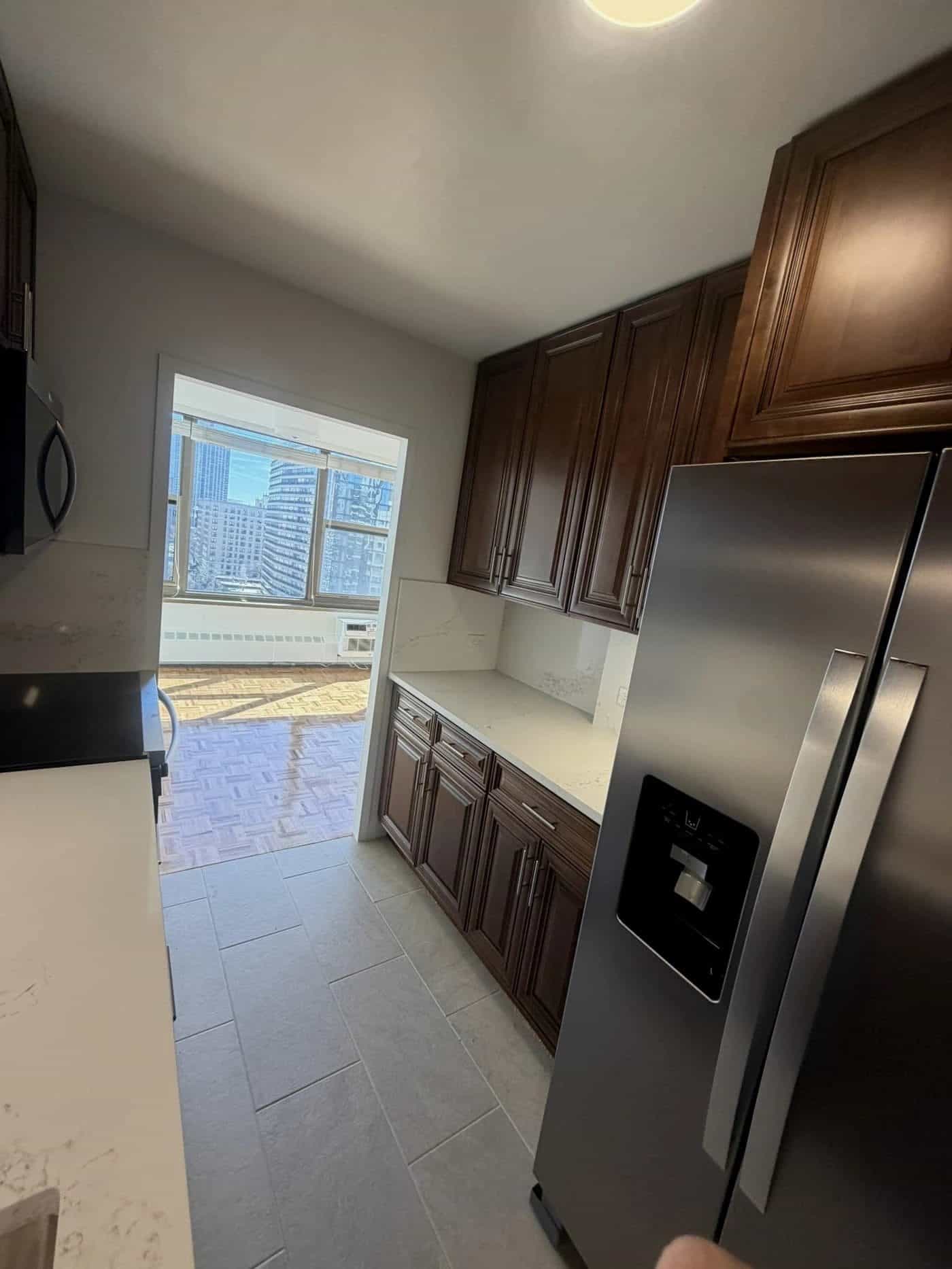 Charleston Saddle kitchen cabinets installed in a Lakeview East, Chicago condo