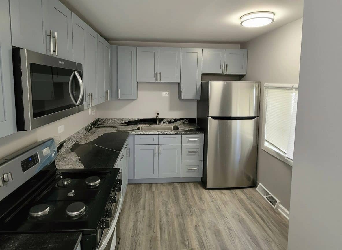Gray shaker kitchen cabinet layout installed in Markham, Illinois home kitchen