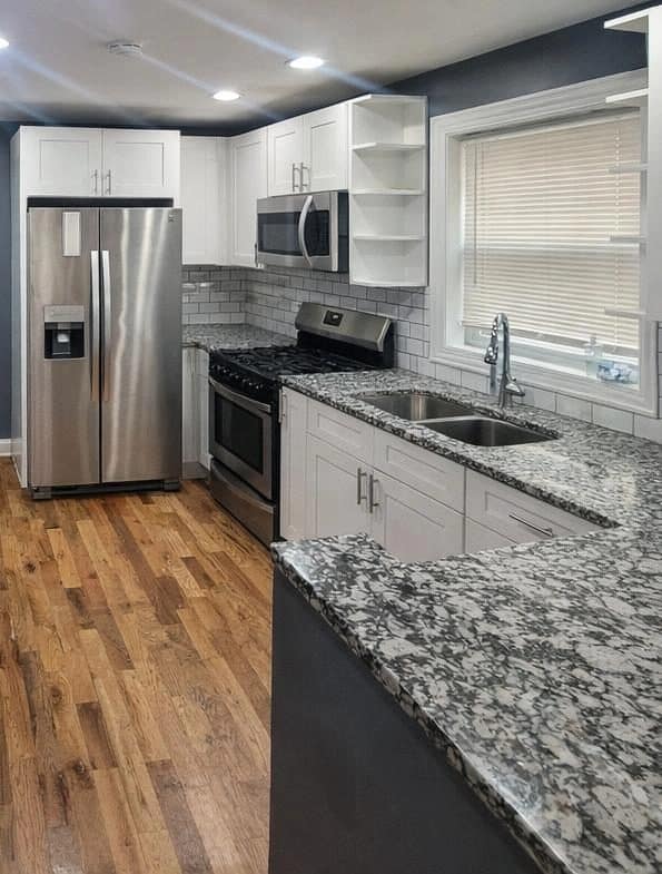 White shaker kitchen cabinets installed in a Belmont Cragin, Chicago project