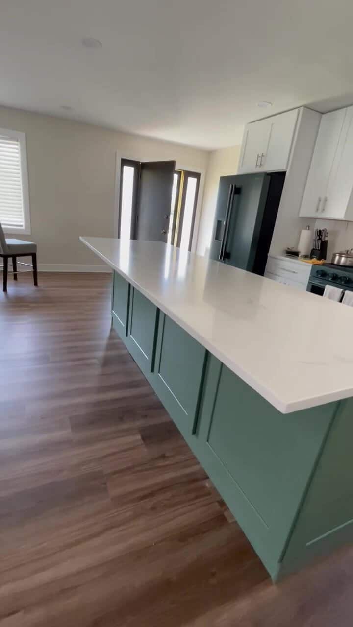 Full Shaker Jade green island with waterfall quartz top and white cabinets, Melrose Park IL