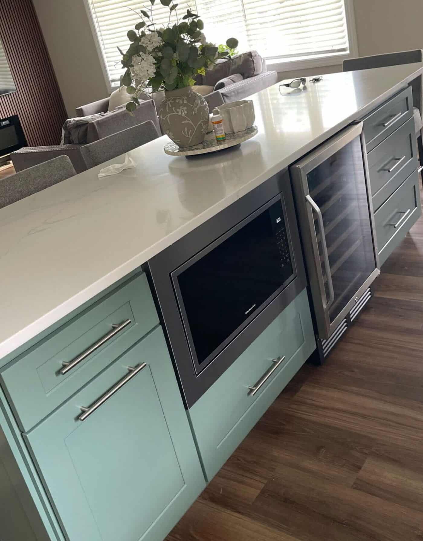 Shaker Jade green kitchen island with white quartz waterfall countertop installed in Melrose Park IL